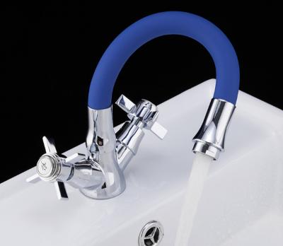 China Metered Basin Faucets And Bathroom Faucet Hot Water And Cold Water Doble Handle for sale