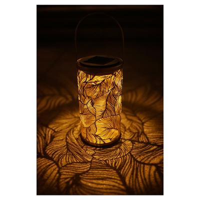 China Art Decor Popular Laterne Solar Power Metal Lantern Home and Garden Decoration Ginkgo Shaped Waterproof Led Lantern for sale