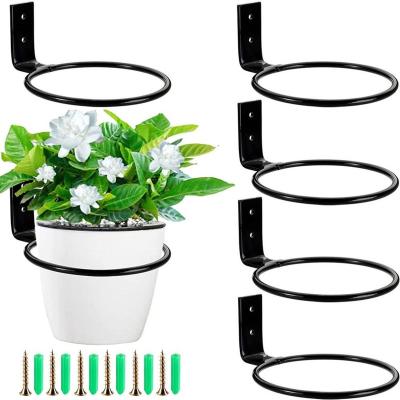 China Idyllic Trapezoidal Multi-layer Trapezoidal Balcony Rack Wrought Iron Living Room Flower Pot Indoor Outdoor Home Floor-Standing Shelf for sale