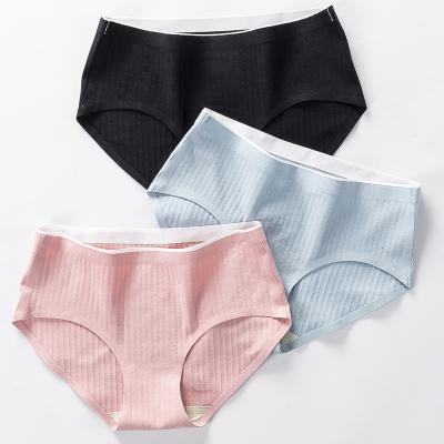 China Seamless Women's Panties Cotton Solid Color Mid Waist Briefs Laser Cut Women's Traceless Panties for sale