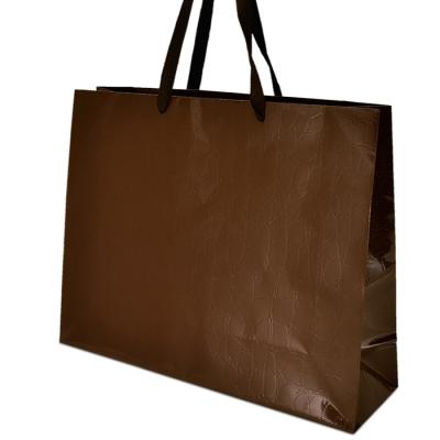 China Recyclable Grocery Packaging RTS Printed Coated Paper Bag With Twill Handles for sale