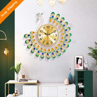 China New classic/postmodern factory direct sales synchronize simple peacock living room wall clock home decoration clock hanging creative for sale