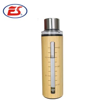 China 2020 Sustainable Private Label 650ml BPA Free Glass Water Bottle Bamboo Outer With Scale for sale