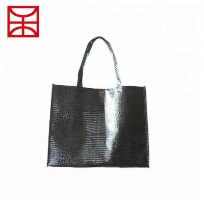 China Wholesale fashion eco-friendly plastic high grade fabric carrier luxury non woven handled shopping bag for sale