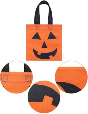 China Halloween Pumpkin Handled Tote Bags Halloween Non-Woven Candy Bags Trick or Treat Candy Bags for sale