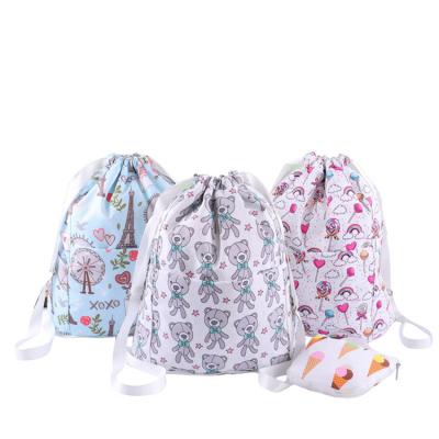 China Environmental protection Eco Recycled Drawstring Pouch Bundle Pocket Non Woven String Bag With Logos Reusable Polyester Non-Woven Bag for sale