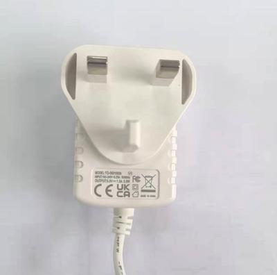 China UK 5v 12v 0.5a 1a 2a Power Adapter AC To 12w DC Power Supply Wall Quantity With UKCA 61*26*33mm (L/W/H) for sale