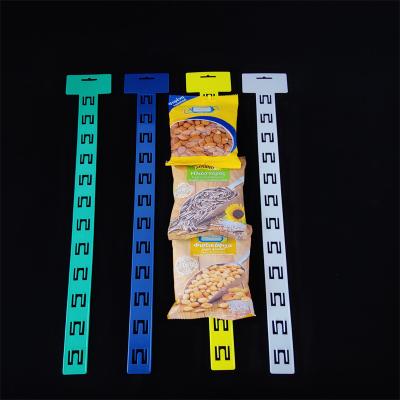 China Supermarkt Shelf Free Sample Supermarket Display PP Hanging Plastic Clip Strips for sale