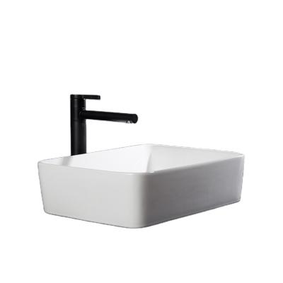 China Modern Bathroom Basin Sink Table Top Wash Art Ceramic Basin Designs Suitable For Multiple Scenarios for sale