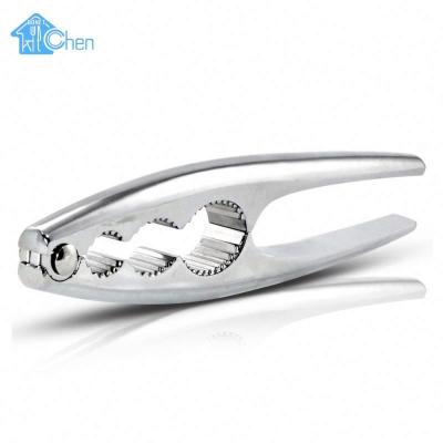 China Viable Stainless Steel Peeling Tongs Seed Cookie Black Melon Seeds Pistachio Seeds Pine Nuts Sheller Kitchen Tool for sale