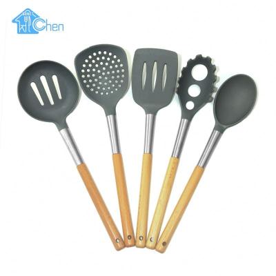 China Viable OEM Accepted Cooking Tool Kit Kitchen Wood Nylon Utensils Accessories Modern Kitchen Handle Kitchen Supplies for sale