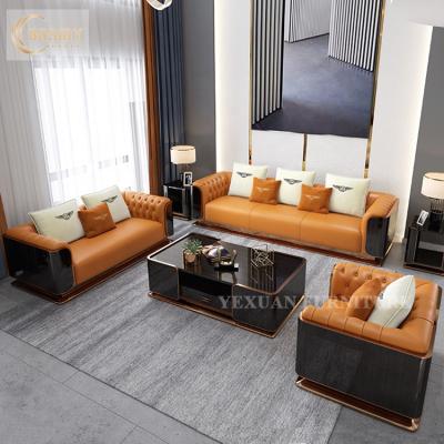 China Modern Living Room Furniture Stainless Steel Tufted High Quality Luxury Leather Upholstered Sectional Sofa for sale