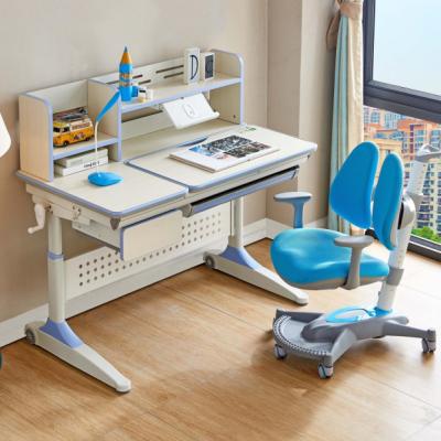 China Eco-friendly Wooden Frame Top Height Adjustable Metal Study Table And Chair For Kids Children Furniture for sale