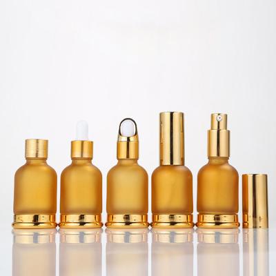 China New Cosmetic Transparent Oil Bottle Emulsion Perfume Spray Bottle With Low Dropper Press Glass Bottle for sale