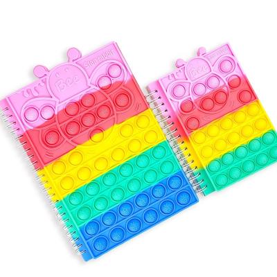 China Fashoion 2023 silicone elephant pop cover notebook kids back to school fidget toys push A5 loose spiral bubbles notebook for sale