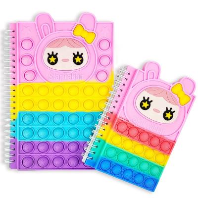 China Fashoion 2023 Hot selling cute Note Book A5 Rainbow Silicone Pop Up Anti Stress Relief Cover Popper Push Bubble Silicone Notebook for sale