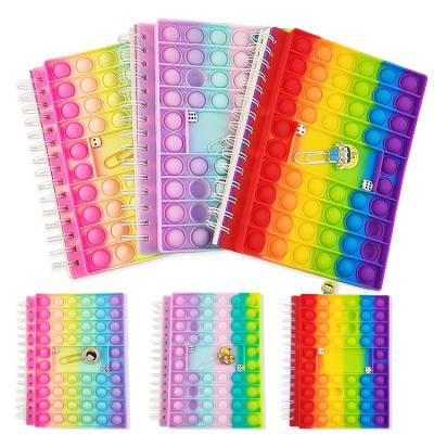 China Spiral Funny playful soft silicone custom color pop dice coil notebook smooth writing stationery writing notebook for kids students for sale