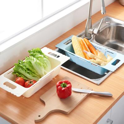 China Retractable Plastic Stocked Kitchen Vegetable And Fruit Tableware Sink Drain Basket for sale