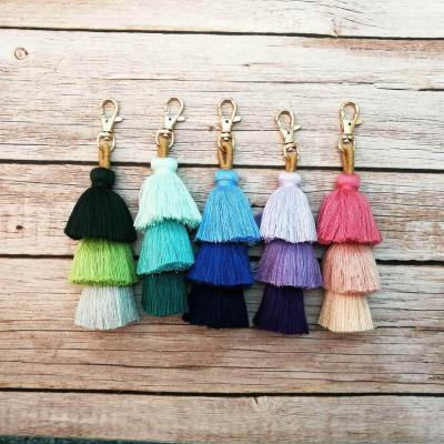 China Daily Life Bohemian Style Handmade Multilayer Cotton Tassel Key Chain Bag Rainbow Combo Hanging Key Chain for sale