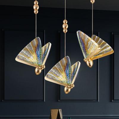 China Modern Designer Nordic Decorative Butterfly Lamp Gold Metal Hanging Acrylic Pendant Light For Dining Room for sale