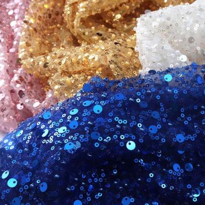 China 2023 Viable Tulle Lace Fabrics With Sequin By The Yard Sequin Beaded Lace Fabric For Dresses for sale