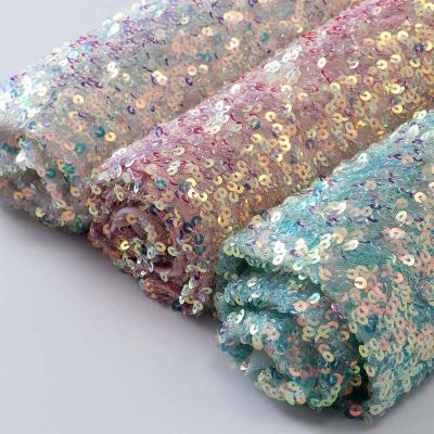 China Shiny Polyester Spandex Elastic Mesh Embroidery Sequins Lace Up 4 Way Stretch Sequin Fabric for sale