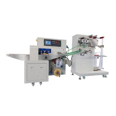 China High Quality Disposable Facial Cotton Products Packing Machine 100% Wet Towel Tissue Machine With Cutting And Folding Function for sale