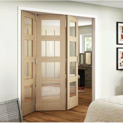 China Modern Golden Home Porcelain Made Flush Wood Framed Interior Bifolding Glass Panel Door for sale