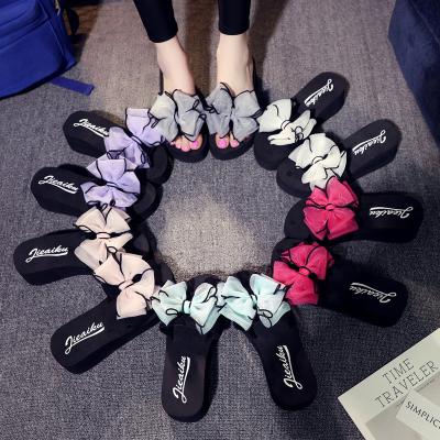 China 2022 new fashion trend women's soft clog slippers summer handmade lady bow wedge heel non-slip sandals thick bottom lady for sale