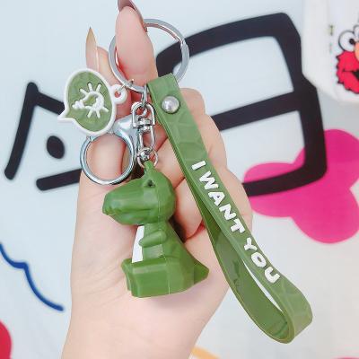 China Creative Metal Cartoon Section Dinosaur Car Silicone PVC Key Chain Ins. Geometric Cute Couples Bag Pendant for sale