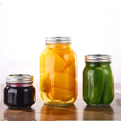 China Wholesale 4oz 8oz Condiment Bottle 16oz Airtight Mouth Food Storage Clear Glass Ball Mason Jars 32oz Width With Lid for sale