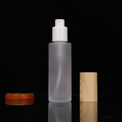 China Personal care wholesales 20ml 30ml 40ml 50ml 60ml 80ml 100ml frosted glass cosmetic bottle with pump//spray lid for sale