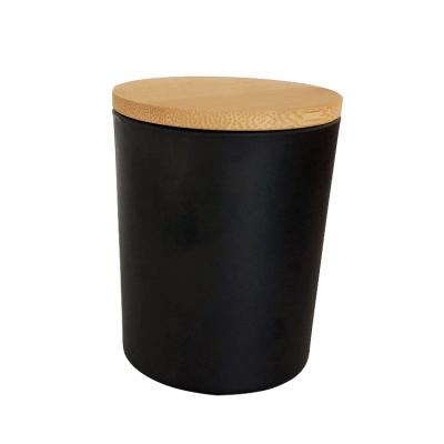 China Weddings Wholesale Hot Sale 7oz 220ml Luxury Empty Matte and Frosted Black Glass Wholesale Candle Jars with Wooden Lids for sale