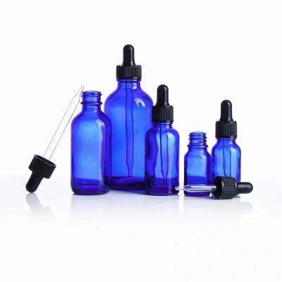 China Hot sale luxury cosmetic wholesale 10ml 30ml 50ml bule clean essential oil dropper glass bottle in stock for sale