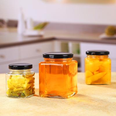 China Wholesale Small Square Food Storage Clear Glass Bottle Empty Jam Jar Sealer With Metal Lid Bulk for sale