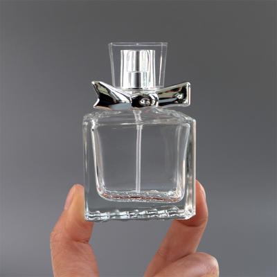 China Wholesale Custom Empty Square Spray Clear Glass Perfume Bottle Small Mini Personal Care Sample In Stock for sale