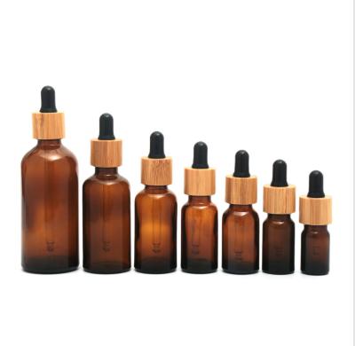 China Wholesale Hot Sale 10ml 15ml Ember Essential Black Spray Oi Essential Oil Dropper Bottle Glass Bamboo Luxury for sale