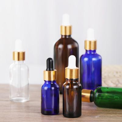 China Custom luxury amber glass empty cosmetic label 5ml 10ml 15ml 20ml 30ml 50ml 100ml essential oil bottle in stock for sale