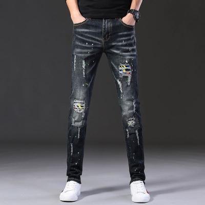 China Sustainable Mens Vintage Splatter Ink Printed Streetwear Ripped Straight Jeans Pants Slims Holes Male Motorcycle Casual Denim Pants Tapered for sale