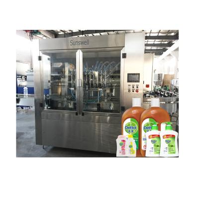 China Beverage hair oil bottle filling machine/filling machine/hand sanitizer detergent filler for sale