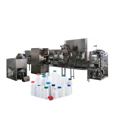 China Automatic Beverage PE Bottle Washing Rotary Filling Sealing With Aluminum Foil Packing Machine for sale