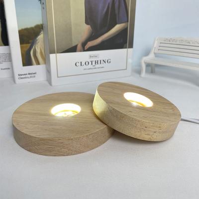 China Wholesale Modern Low Romantic Usb Charginground Mini Led Rubber Wooden Luminous Night Light Base for sale