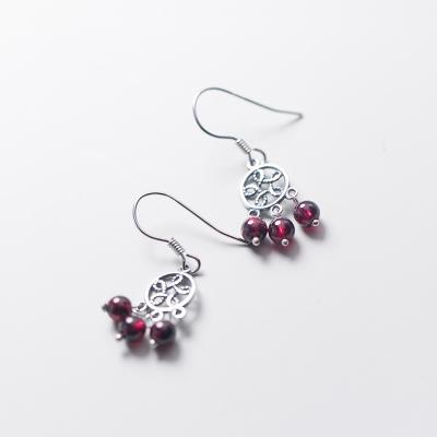 China Retro simple silver hollow round flowers vintage earrings s925 soft garnet dangle drop earrings for sale