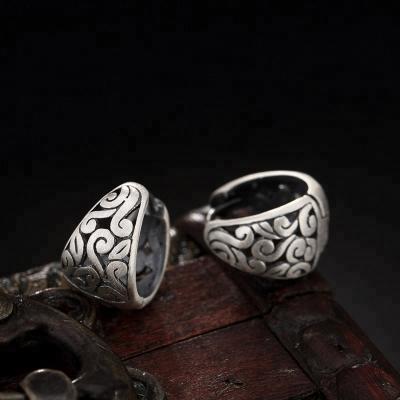 China Unique 100% 990 Sterling Silver Hoop Earrings Retro Fashionable Antique Hollow Earring Totem Personality Jewelry for sale