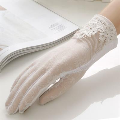 China Fashionable cheap shade summer elegant black evening bridal white women wedding lace up gloves for sale