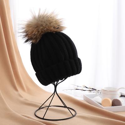 China COMMON cheap faux or real fur pom ball winter warm knitted bobble beanie hats for women for sale