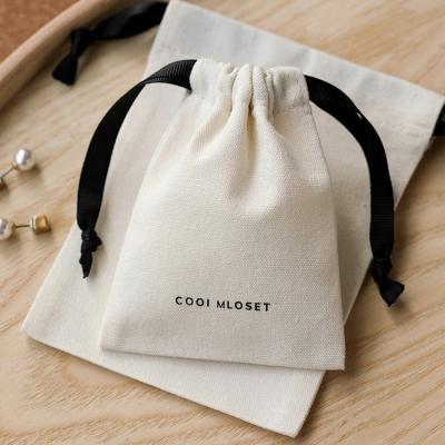 China Drawstring Personalized Custom Logo Canvas Cotton Satin Ribbon Candle Soap Drawstring Jewelry Pouch Bag for sale