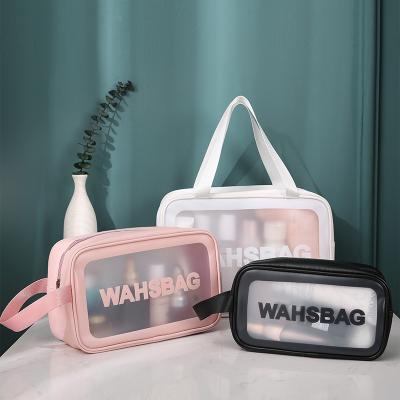 China Lady Custom Logo Waterproof PVC Cosmetic Organizer Clear PU Zipper Wash Makeup Travel Bath Bag for sale