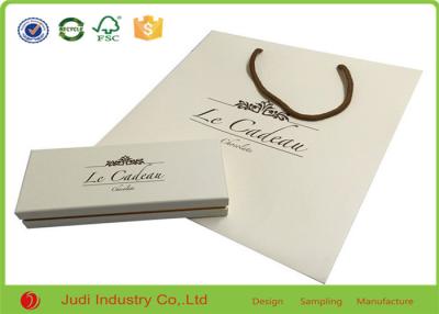 China Free Design Recyclable Printed Kraft Paper Bags White Paper Shopping Bags for sale