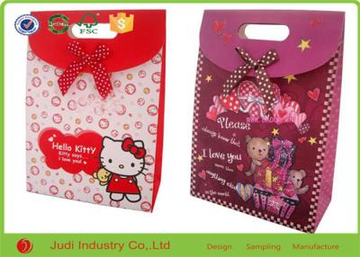 China 4 Color OEM Kraft Paper Bags Size 25 X 35 X 10 CM Packaging Christmas Gift With Ribbon for sale